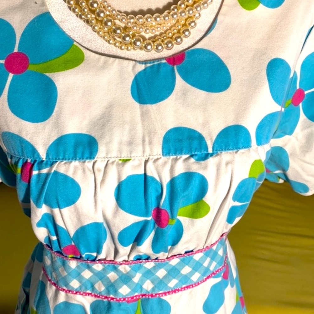 White Cross bright floral uniform top
